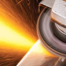 Close up of angle grinder with sparks